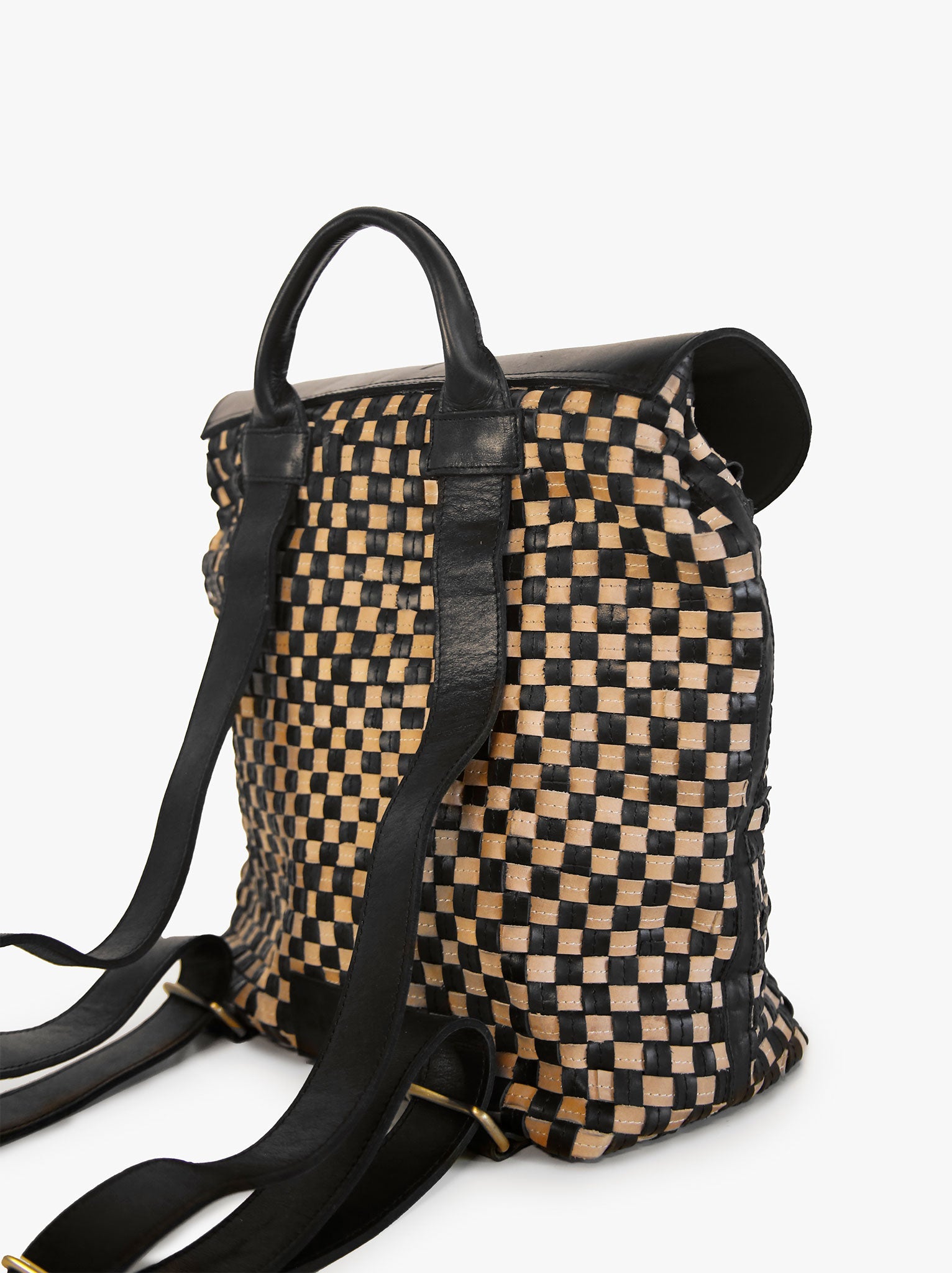Back of black and tan basketweave backpack, adjustable shoulder straps and top handle on white background. #Color_Black/Tan