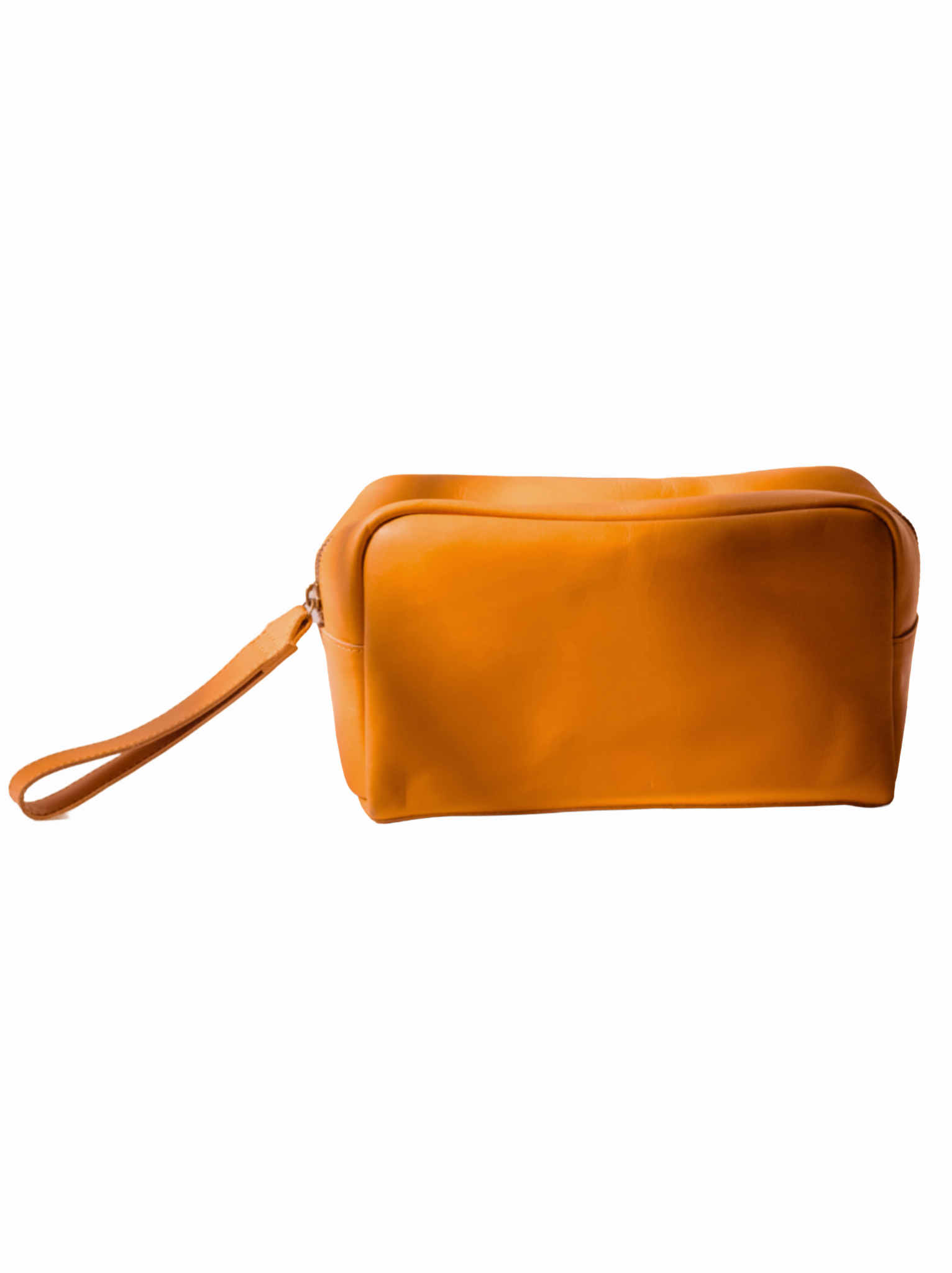 A rectangular cognac leather cosmetic pouch with a wrist strap, shown from a side profile against a plain white background. #Color_Cognac