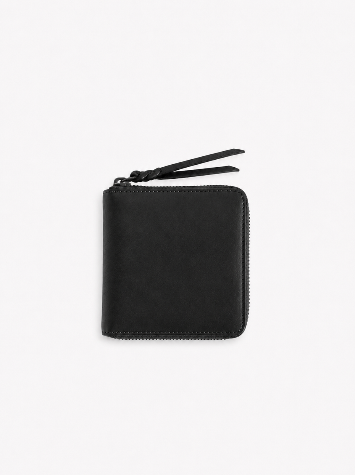 A black leather zip-around wallet with a matching leather zipper pull, shown flat against a clean white background. #Color_Black