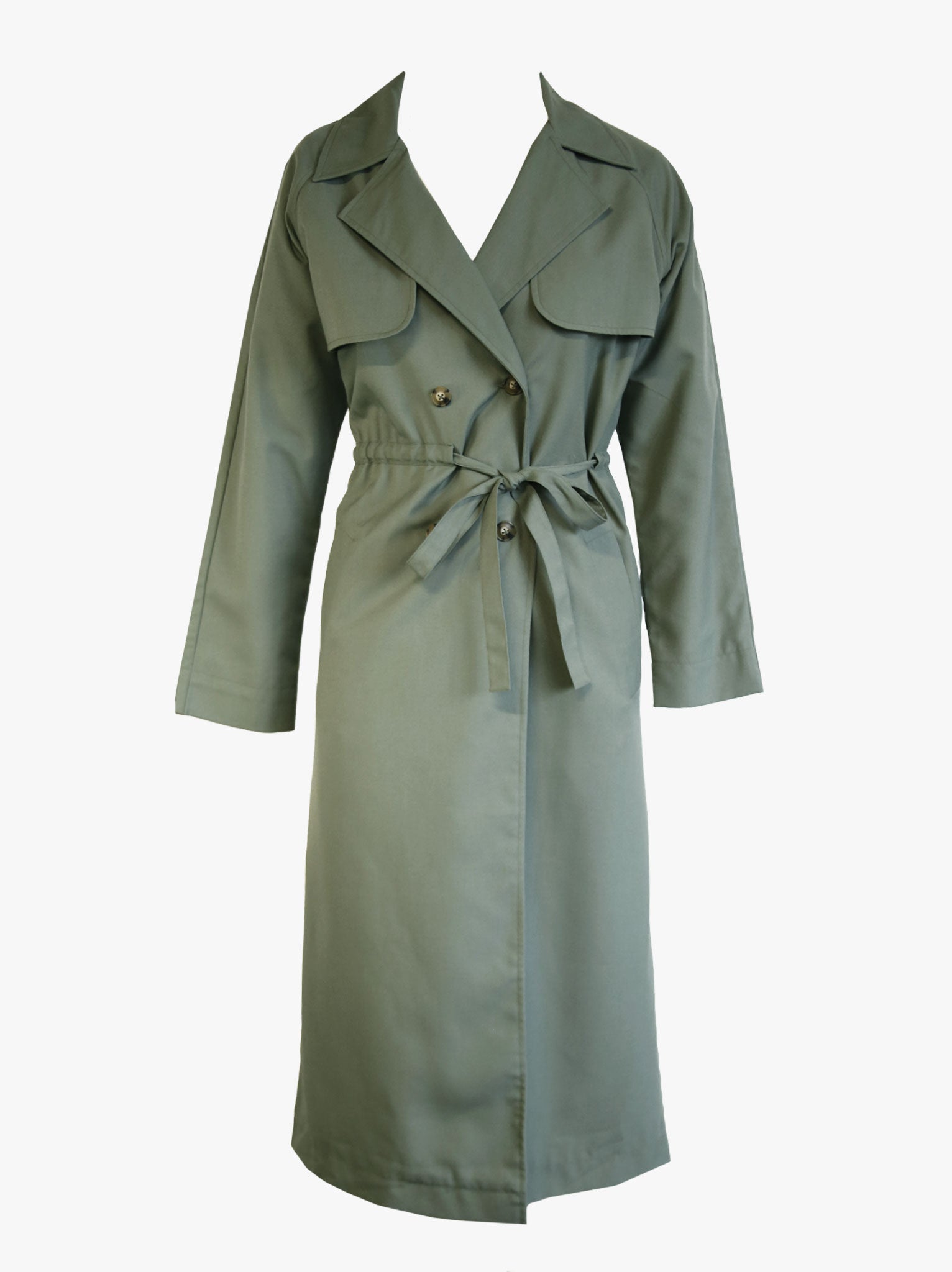 Belted long sleeve green trench coat with storm flaps against white background. #Color_Moss